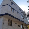 کار در ارتفاع قومس، شستشوی نما و نصب تابلو در سمنان