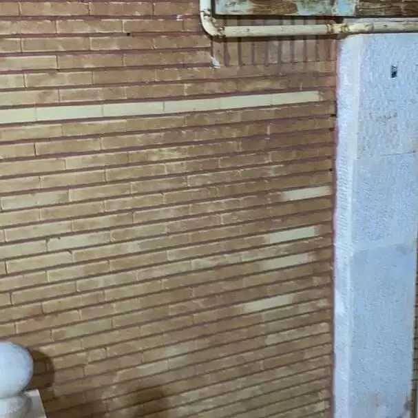 شستشوی دیوارآجری با دستگاه سندبلاس و موادسیلیس