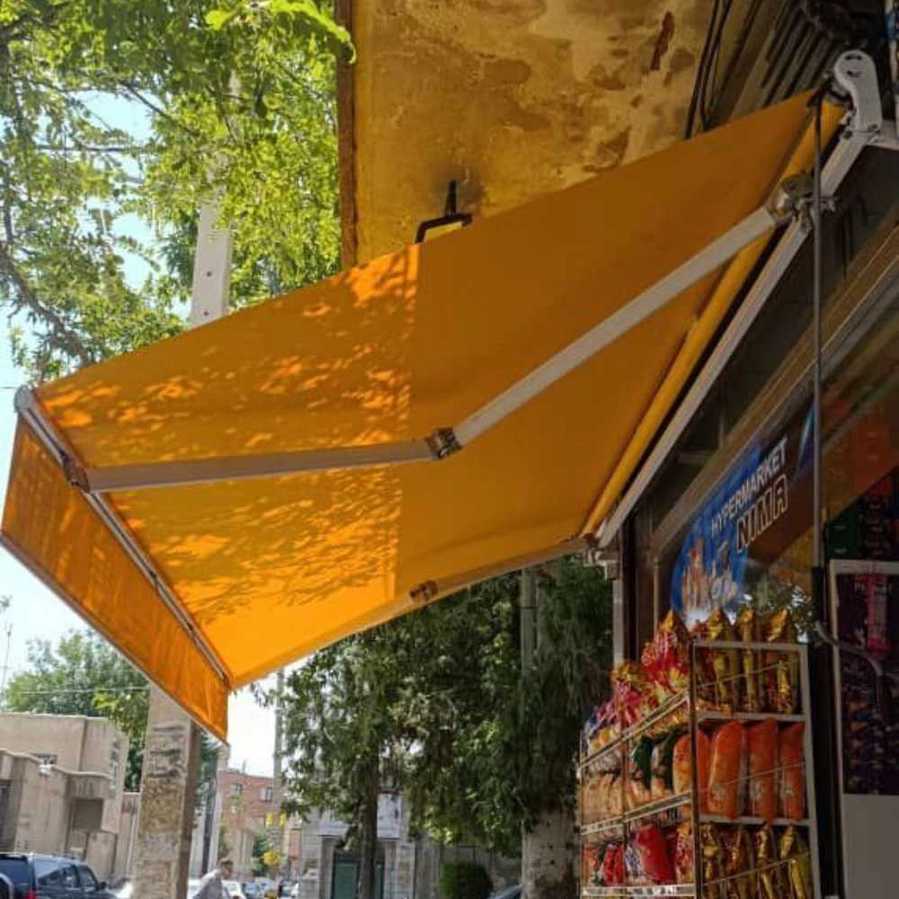 قیمت سایبان بازویی در تهران چقدر است؟ بررسی عوامل تأثیرگذار