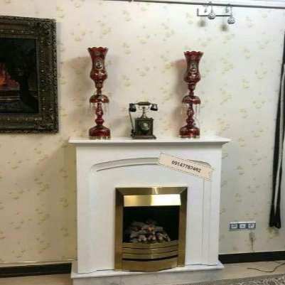 شومینه های کلاسیک(برقی،گازی،چدنی)با فرم چوب و سنگ