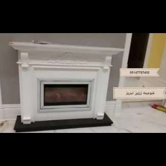 شومینه های کلاسیک(برقی،گازی،چدنی)با فرم چوب و سنگ