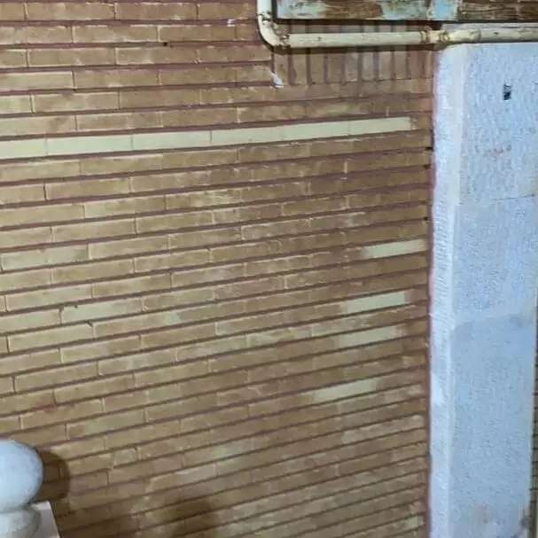 شستشوی دیوارآجری با دستگاه سندبلاس و موادسیلیس