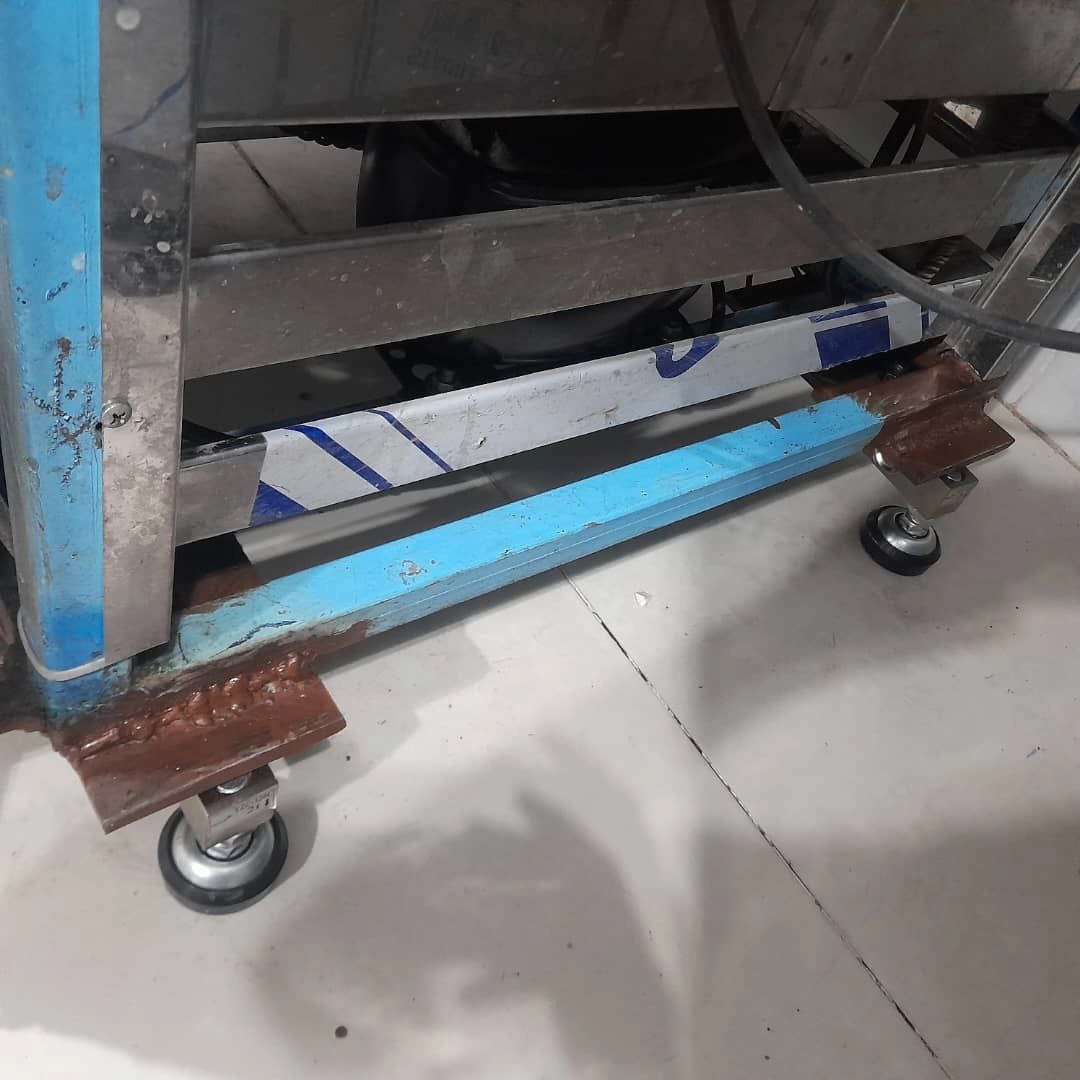 نصب قسمت توزین روی مخزن شیر سردکن