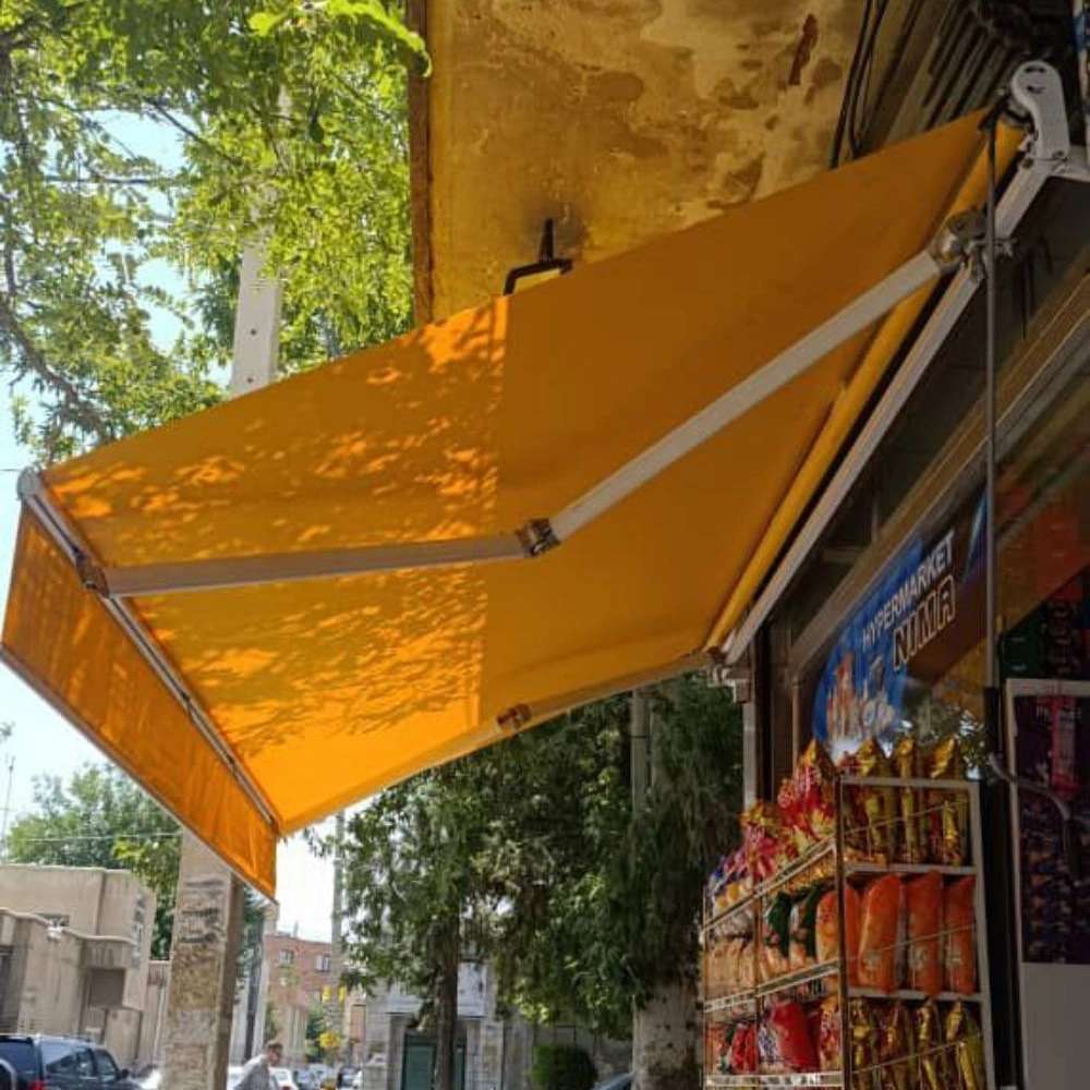 قیمت سایبان بازویی در تهران چقدر است؟ بررسی عوامل تأثیرگذار