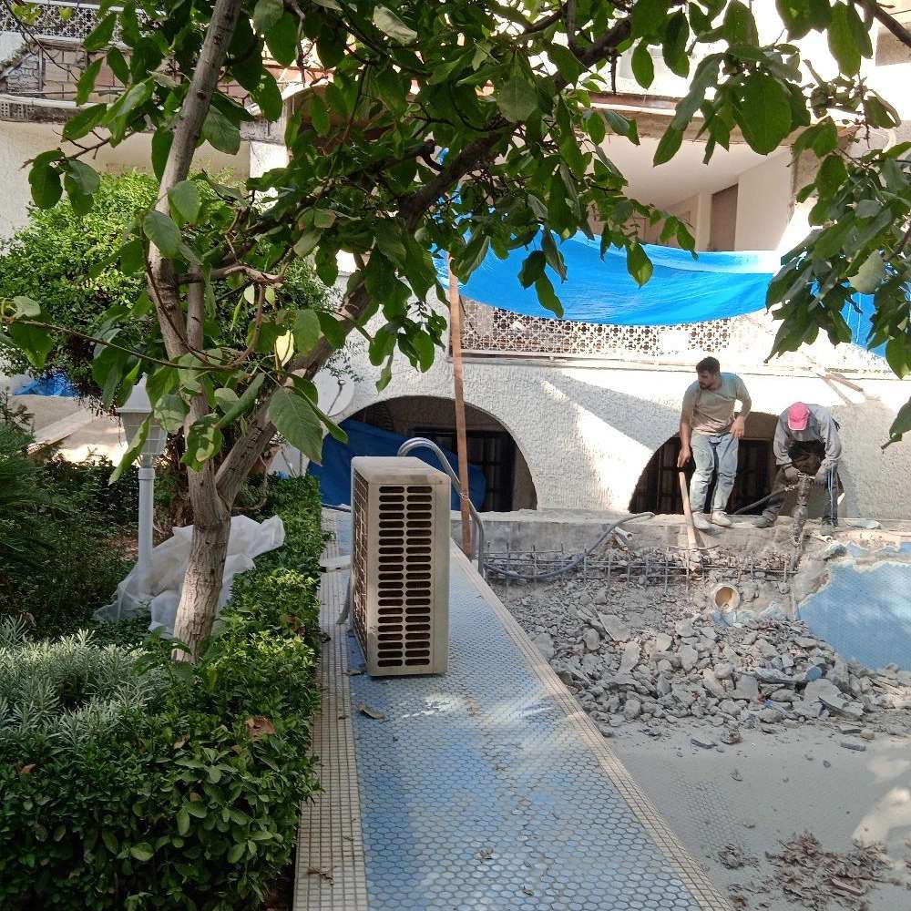 تخریب با بیل مکانیکی